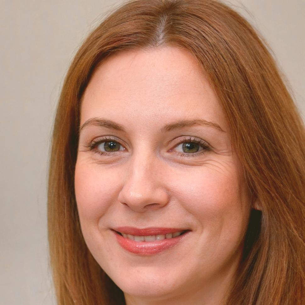 Professional headshot of Zara Blackwood, Senior Financial Goal Strategist